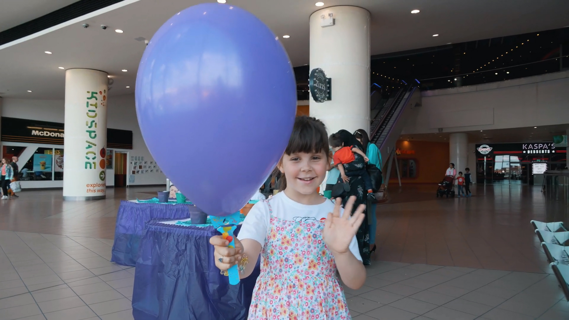 Girl Holding a Balloon on a BalloonGrip®